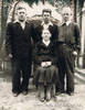 Мария Крум с сыновьями.Казахстан. Фото начала 1950-х гг.На фото: сидит - Мария Крум (Maria Krumm), стоят сыновья (слева на право):Виктор (Viktor), Эдуард (Eduard), Филипп (Philip).