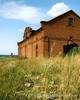 с. Гречихино (бывшая немецкая колония Вальтер) Жирновского района Волгоградской области.Фото 2006 г.Это старинное здание когда-то служило зернохранилищем.